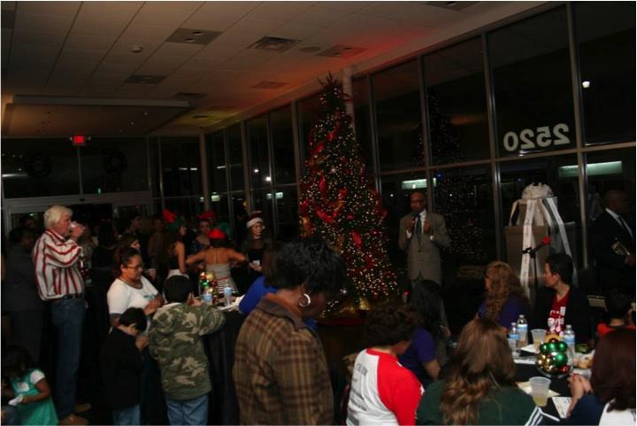 Many attend the toy drive held at Stewart Cadillac’s downtown dealership. 
Courtesy of Howard Houston
