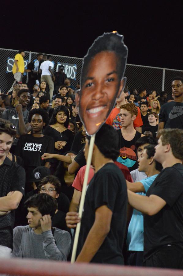 Students cheer on runningback Antoine Stevenson. 