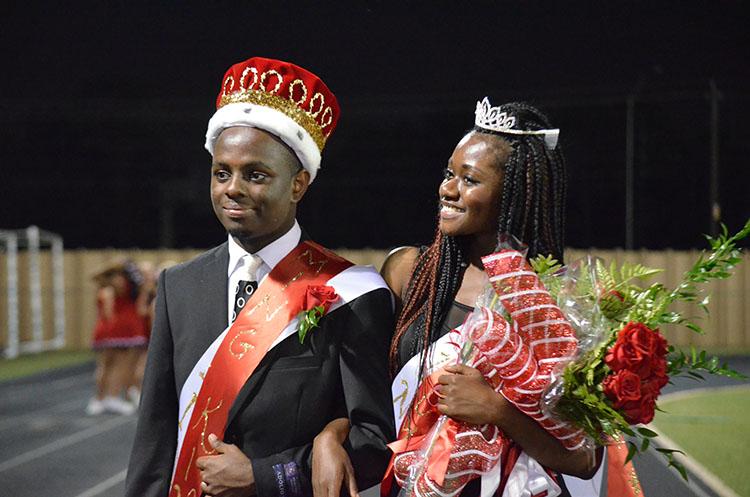Seniors Tyler Smith and Fatou Sakho are crowned Homecoming King and Queen. 