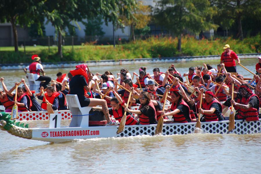 The dragon boat team works hard to pull ahead of the competition.