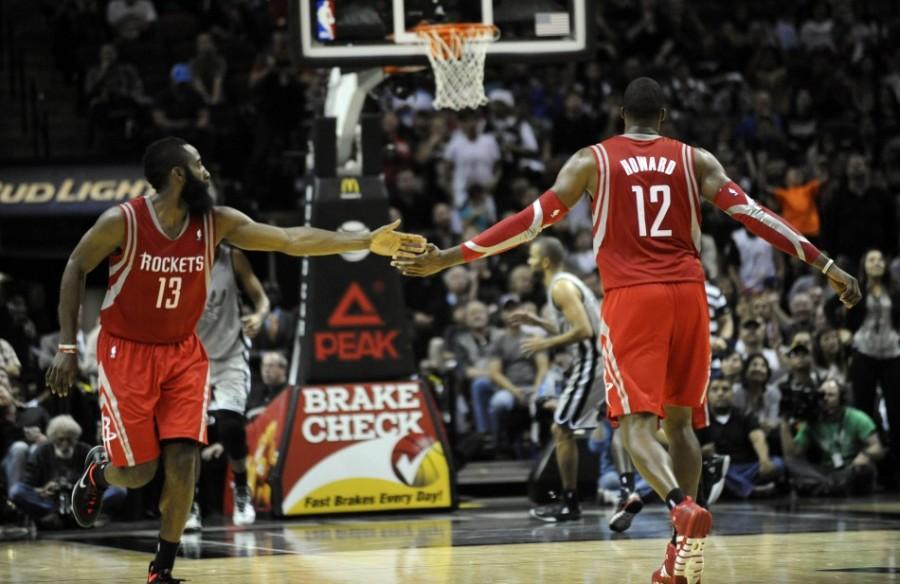 In the NBA, they say you can’t know anything about a team or until that team has played 20 games. 
Well, the Houston Rockets have played 20 games. And their red hot 16-4 start after the first 20 games of the season, only 1.5 games behind Golden State, the number one team in the league, provides a pretty decent sample size for what is to come.
But let’s first analyze what else they say in the NBA, specifically what they say about the Rockets.
They said the Rockets’ bench was far too thin, that the team did not have enough role players to complement the two stars, James Harden and Dwight Howard.
They said the front office failed its duties in the offseason, as the roster failed to acquire any of the superstar free agents.
They said the team’s defense was woeful, and Houston would never be championship contenders while allowing so many points on one end of the court.
And two individuals who will go unnamed, called one of our players “soft”, while the other said that the city of Houston was “dirty”.
After 20 games, the Rockets have dispelled many of these insinuations. Yet the Rockets have already faced quite a number of challenges.
The injury bug has bit the Rockets hard and early this year, giving the team a “next man up” mentality. Last Wednesday, during the Rockets’ dismantling of the Grizzlies, four Rocket players sat on the bench dressed in suits. And not just any four Rockets either.
Starting guard Patrick Beverley, known for his defensive tenacity, was one of the Rockets in street clothes. Beverley has had three hamstring injuries in the last month alone, but did come back in an impressive manner against the Suns last Saturday night, with 19 points off five 3-pointers and six rebounds. But Beverley has been sighted spottily this season, playing in some games every other week.
Starting center Dwight Howard, who the Rockets planned to center their offense around more this year, has been dealing with a nagging knee injury. His knee problems have kept him off the court for a good amount of time, which is no good for any Rockets fans. In fact, the last time Howard played in a game for the Rockets was November 17 at Memphis.
Starting forward Terrence Jones has also been out for some time. Jones has not suited up for Houston since November 3, after suffering nerve damage in his left leg. Jones could not even move his left leg with his injury, and has no solid timetable for his return. 
Another significant injury happened to backup guard Isaiah Canaan. Canaan, who was promoted to starting guard after Beverley’s hamstring issues, suffered a nasty ankle sprain against the Clippers on November 28. With Canaan and the other Rockets sidelined, the Rockets have had to look for other options to fill in the scoring void in different games.
James Harden, who is without a doubt the Rockets’ franchise player, has still been consistently providing minutes and buckets for Houston in the midst of all the injuries. Even with a few off nights, Harden deserves his status as one of the premier shooting guards in the league, and he may garner some MVP attention if he keeps his production up and the Rockets’ wins up. But it has been proven that it takes more than one player to win games. So how have the Rockets ended up with the second best record in the entire league so far?
The Rockets bench has stepped up in major ways. The same bench that experts said would be the Rockets’ downfall has toughed out some gritty wins. Backup forward Donatas Motiejunas has been providing stellar post play in the wake of Jones’ injury. Backup center Tarik Black, who was an undrafted rookie that was signed this year, is nicely filling in the role of a center. Even third string center Joey Dorsey has given serviceable minutes off the bench by producing off the boards. In essence, a host of bench players have made the most of their newfound playing time. Forwards Kostas Papanikolaou and Francisco Garcia have hit timely big shots down the stretch. Third string guard Nick Johnson, a rookie out of Arizona, hit a game winning layup against the Timberwolves last Friday. The Rockets at times have played a lineup of Johnson-Papanikalaou-Garcia-Motiejunas-Black because of injuries and fatigue. For most casual fans, it would be tough just to know who these players are, much less expect them to win games.
Free agent acquisitions have also helped out in the Rockets’ areas of need. James Harden has been playing this season with added firepower on the wing with veteran journeymen Jason Terry and Trevor Ariza. Both have contributed to the Rockets’ average of 12.0 three pointers made per game, a league best. Terry and Ariza have also contributed to the Rockets third ranked defense, allowing only 94.0 points per game. Although the fans of Houston may have wanted bigger names to have come to town during the offseason, Terry and Ariza have found their niches on the team as shooters and veteran leaders who fit rather nicely with the rest of the Rockets.
The Rockets have proven that they have both depth and defense. Of course, championships are not won in December. They are not won in any month but June. If the Rockets can get healthy by this summer, they will be dangerous in the postseason. It may still be too early to tell, but the Rockets have all the potential to go to the Western Conference Finals. There is still a long way to go, and this season will provide plenty opportunity for the young Rockets to grow together as a team. 
Only time will tell for these Rockets. This team will still have to work as hard as possible in order to erase the sea of doubts surrounding them. Some analysts of the NBA said the Rockets would face the same first round playoff exit. But these were also the same people who said all that other stuff about this team. 
So this is a call to action for all Rockets fans. Houston sports have disappointed many in the last decade, but the title dream is very much aliv

