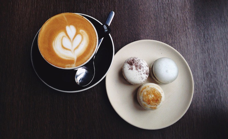 Coffee+and+macaroons+are+few+of+the+fan+favorites+at+Tout+Suite.+