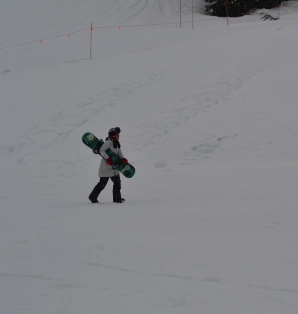 Junior Ishani Shethia snowboards in Park City, Utah after skiing incident.