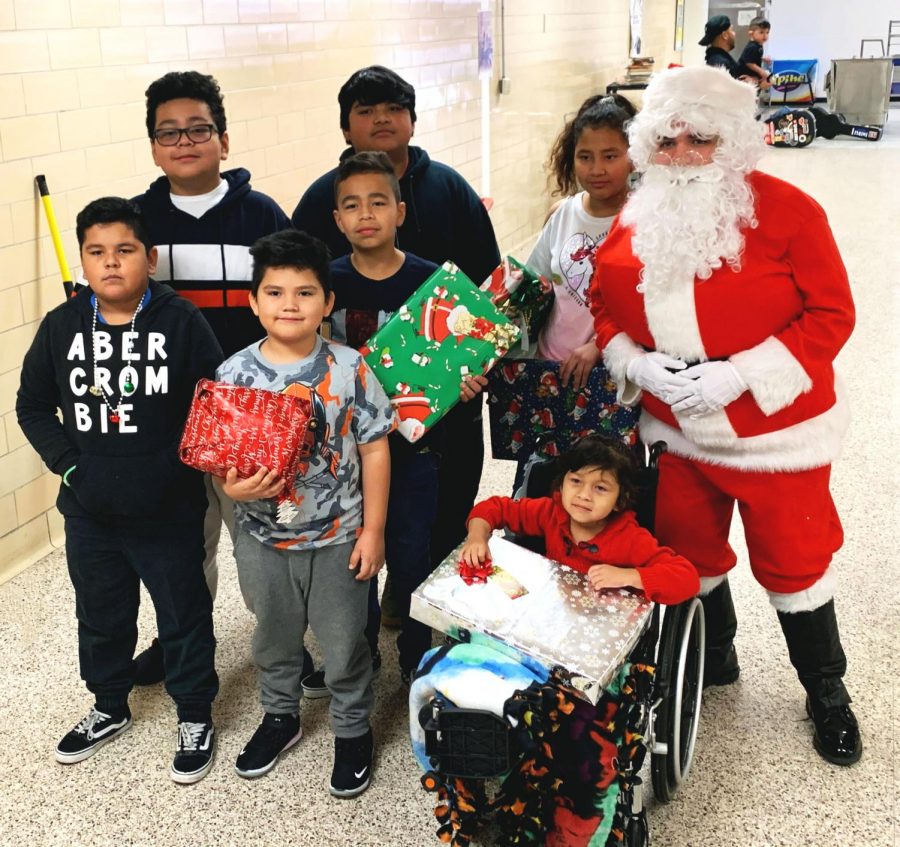 Texas Children’s hospital patients, ranging in age from 5-11 years old, visit Bellaire High School for fun games and gift distribution last year for Project Santa 2019. Each child went home with a gift presented to them by the school based on wishlists the kids submitted in advance. 