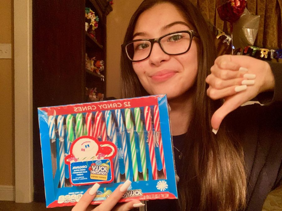 Salma pictured with her least favorite holiday treat, jolly rancher candy canes.