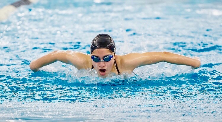 Giselle+Garza+wins+second+place+in+her+heat+on+a+100-meter+butterfly+stroke+at+the+%E2%80%9CCardinal+Classic%E2%80%9D.+The+race+was+hosted+at+Lamar+High+School.+