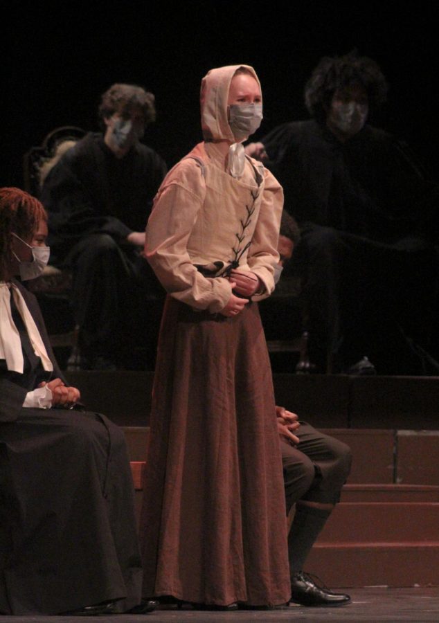 Mary Warren, played by Francesca Camerlo, is accused of witchcraft during the court scene. She grows more distressed as the scene develops and the other girls begin to act strangely.