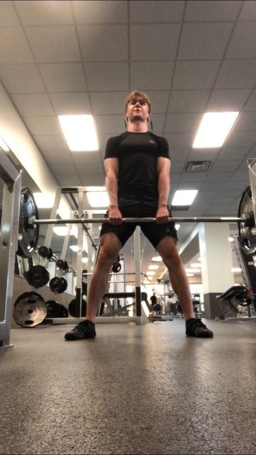 Tim Walter does a deadlift at LA Fitness. He took picture in the morning as he was working out alone. 