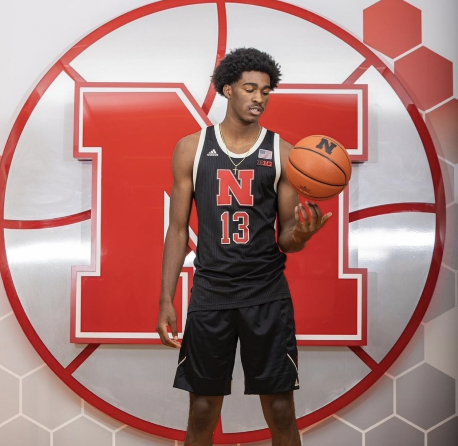 Junior Jacolb Cole, small forward for the Bellaire varsity team, poses for a photoshoot, dressed out in the UNL basketball uniform. This photoshoot took place during Coles official visit to UNL on Oct. 7.