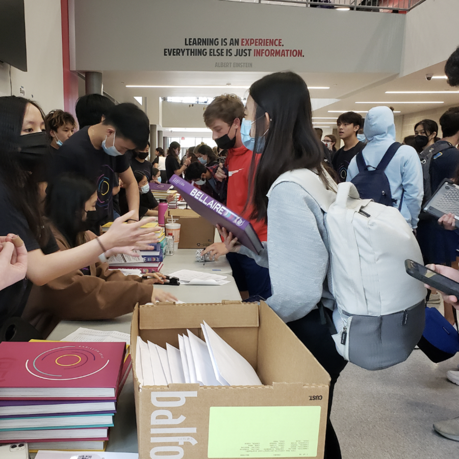 Main Street was crowded with students trying to pick up their yearbooks. Yearbook members were excused from class the whole day to help distribute all the boxes of books for the next few days. 