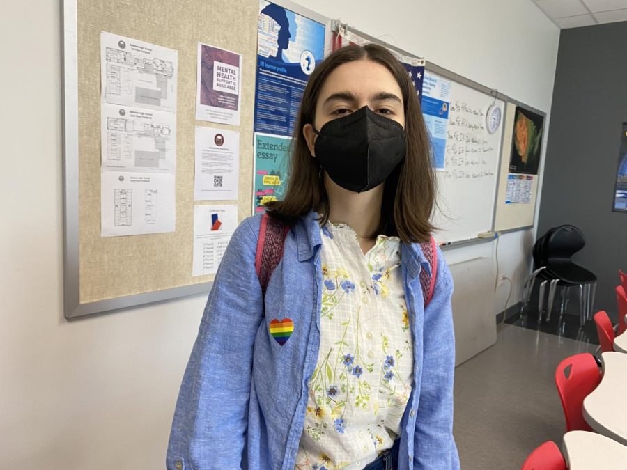 Junior Kalina Peneva shows her support for the Day of Silence by wearing a sticker. Pride stickers and masks were available in room 3703 last Friday.