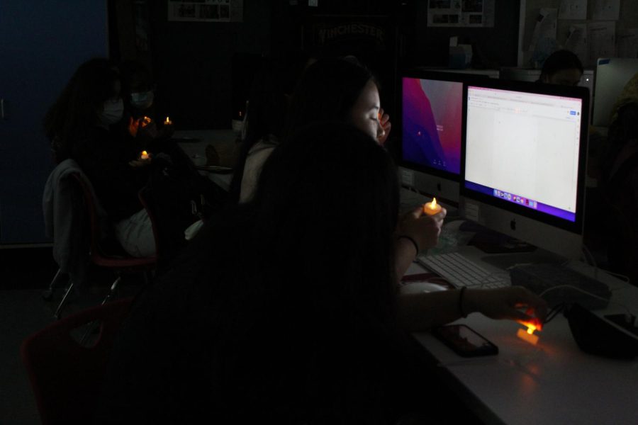 All ten yearbook members and 17 Three Penny Press members turn on their candles for the induction ceremony. The candles represent journalism as the “light of truth.”