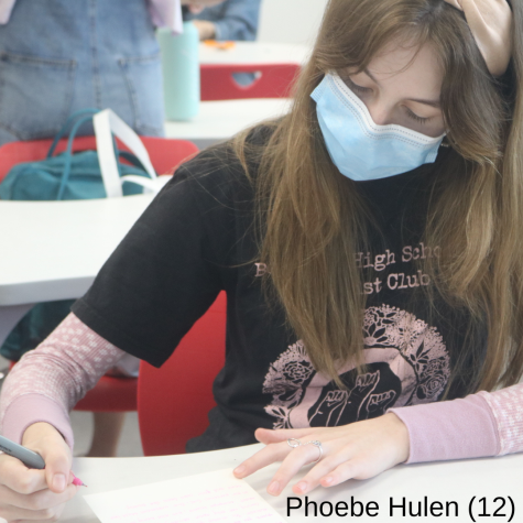 Senior and President of Feminist Club Phoebe Hulen writes a letter as a way to destress. She also chose a matching undershirt to promote the club T-shirts that were $15.