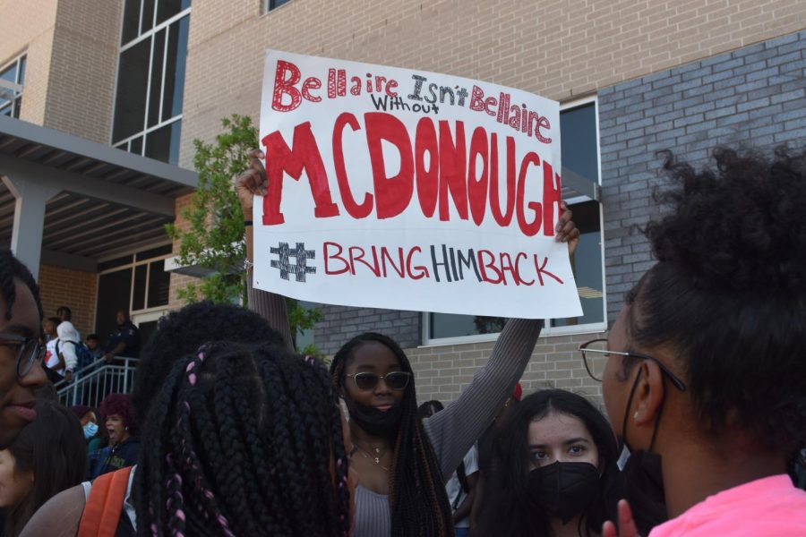 A student displays her handmade sign supporting McDonoughs reinstatement. Senior Nick Palma said he believes this protest will help bring Mr. McDonough back. “I feel like a walkout is something needed for the unneeded replacement of Mr McDonough,” Palma said.