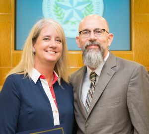(From left) Debbie Campbell and Principal Michael McDonough smile as Campbell is rewarded the 2015 employee of the month for HISD. 

“Debbie Campbell is that perfect team member who is always striving to make each family’s experience with Bellaire a powerful one,” McDonough said.