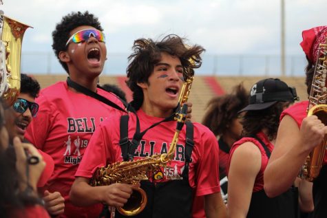 (From left) Sophomore Elijah Johnson and sophomore Matthew Guzman amp up during the Hype Train. A uniquely Cardinal tradition, Hype Trains occur every 3rd quarter during a football game.