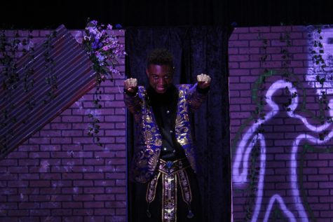 Senior Micheal Carron as Mr. Burns in Act III. As Mr. Burns, Carron sang, rapped and sword fought with Bart Simpson, who was played by Kristen Lea.