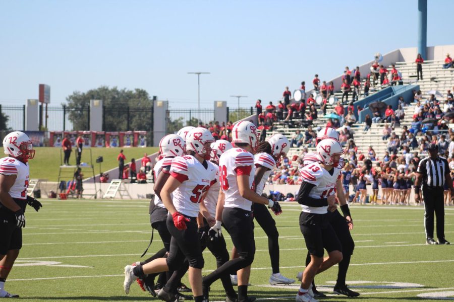 Bellaires football team runs onto the field to face Lamar once again. The team lost 63-0 in this final game of the season.