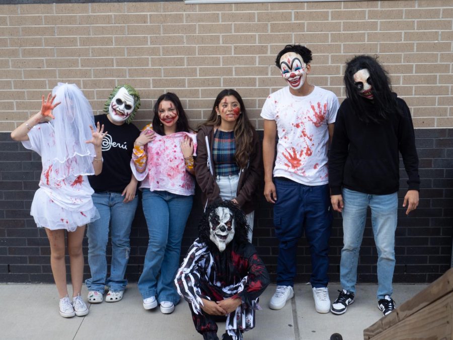 Actors for the haunted house prepare to scare guests after school on Thursday, Oct. 27. The haunted house took place in building T-22.