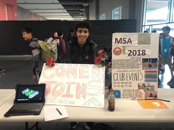 Basem Mohamed encourages students to join Muslim Student Association during Club Jamboree. Mohamed became the president this year to step up and display his leadership skills.