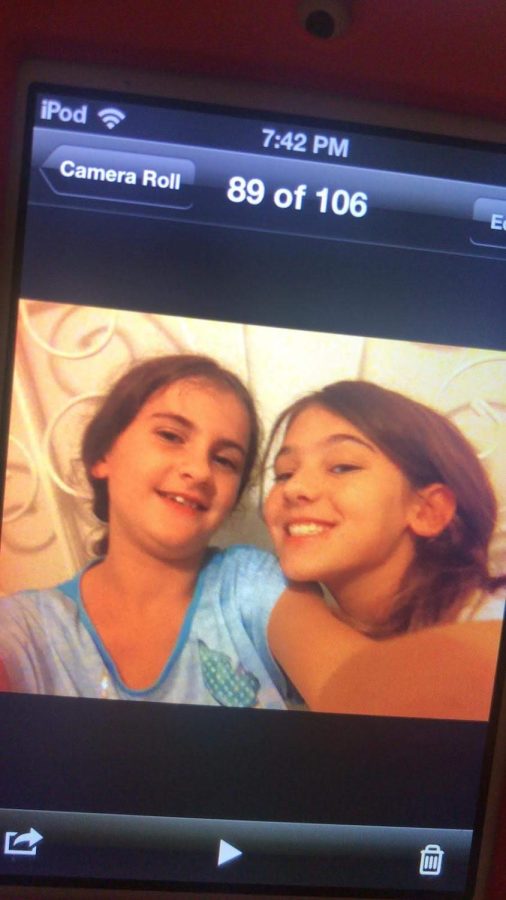 Alaina+and+I+practicing+taking+selfies+at+our+first+sleepover.+Alaina+uncovered+this+picture+when+going+through+her+old+pink+iPod+touch+years+later.+%28from+left%3A+Ella%2C+Alaina%29