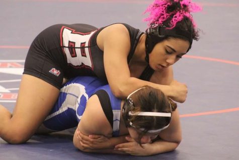Leyla Mejia pins her second opponent for the day as she carries the most wins for Bellaire that day
