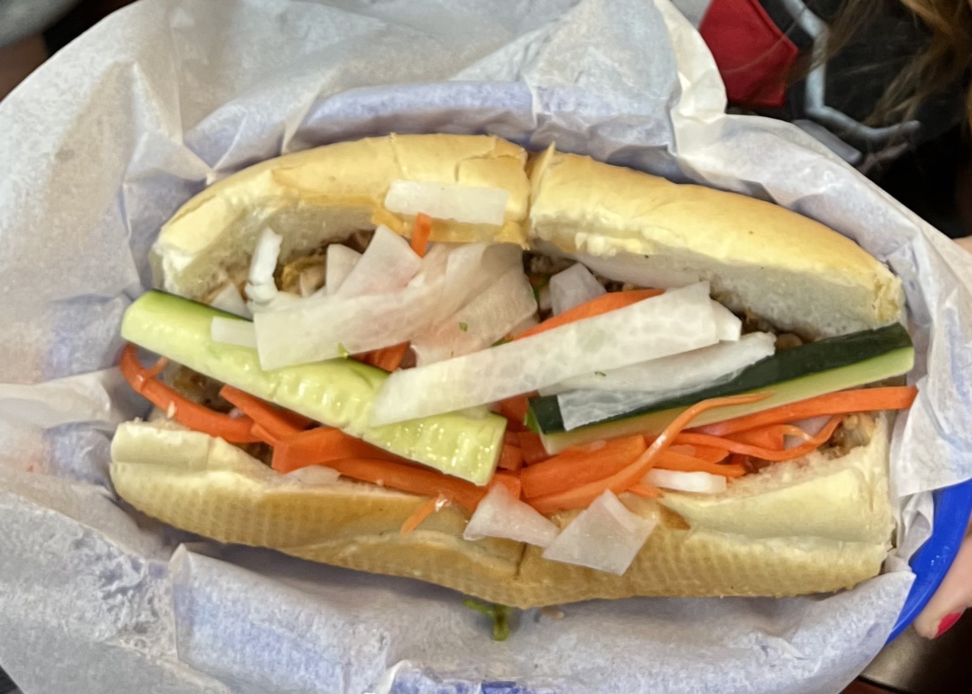 The number five Banh-mi from Pho VN 21. This French-influenced Vietnamese sandwich is filled with pickled carrots and radishes, cucumbers, jalapenos and flavorful chicken.