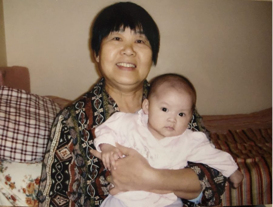 My laolao holding me in her arms in 2006. She visited us in Columbus, Ohio.