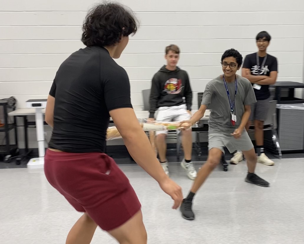 Freshman Rajan Vyas and senior Issac Burns fight one last, non tournament battle before the bell for lunch rings and the members have to clean up. Vyas ends up victorious.