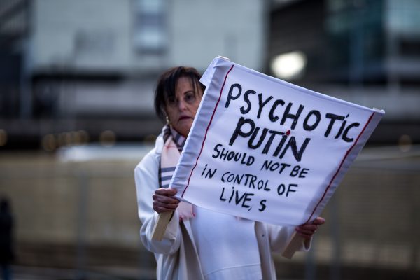 A women in Manchester protests against the villain behind the Russia Ukraine war. Putin breaks families apart; most Russian citizens do not even want this war, and yet they have to fight.