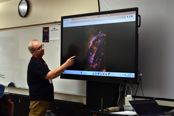 IB Astronomy teacher displays the APOD or Astronomy Picture of the Day. This picture from Oct. 18 features the Veil Nebula, which was created due to the explosion of a star.