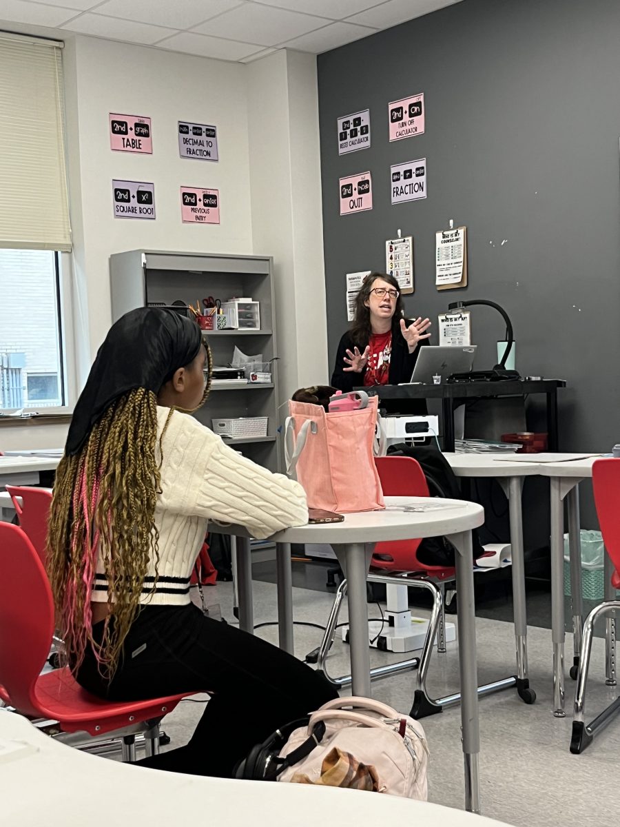 Junior Angel Harper listens as Blessington discusses her writing process for each of her books. Blessington has written seven books and is working on an eighth, The Faculty Lounge, her first adult novel.