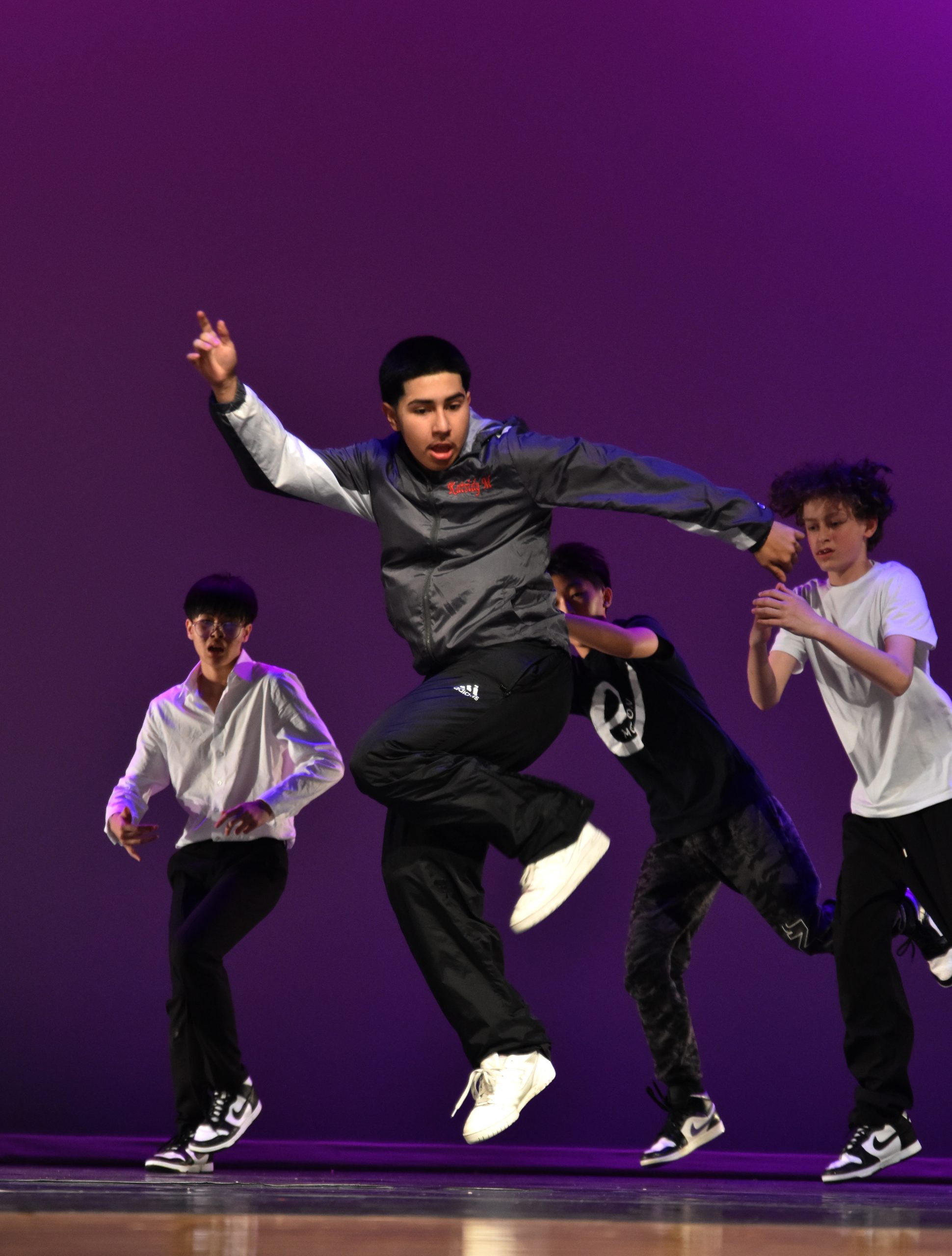 Choreographer and senior Ryan Davalos (center) performs “Dance the Night Away” at the end of the show. He and several other choreographers created this finale of the eMotion Dance Companys fall show.