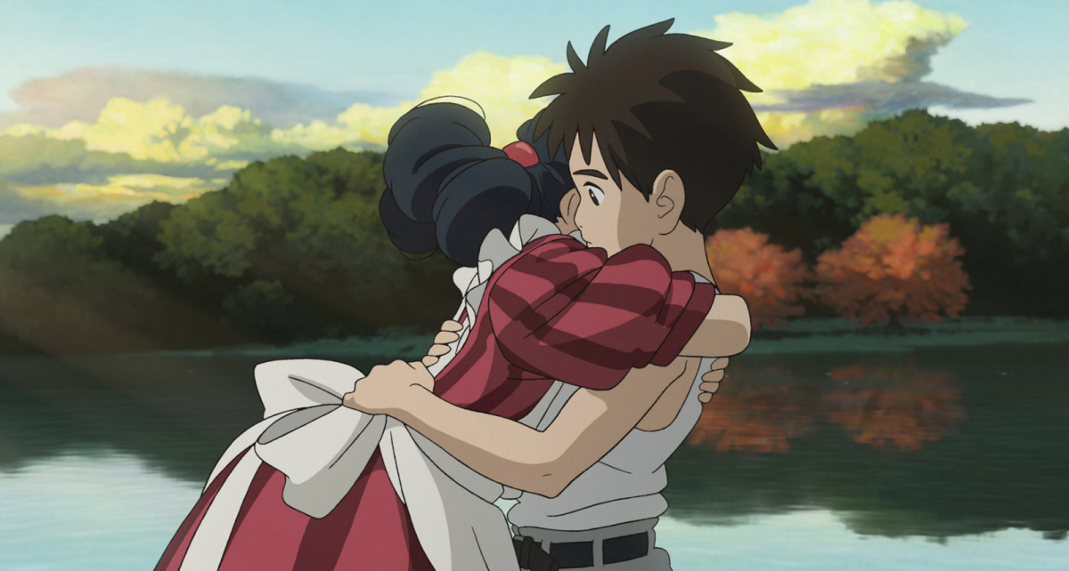 Mahito is in disbelief after finding his mom. A tight embrace is shared between mother and son.