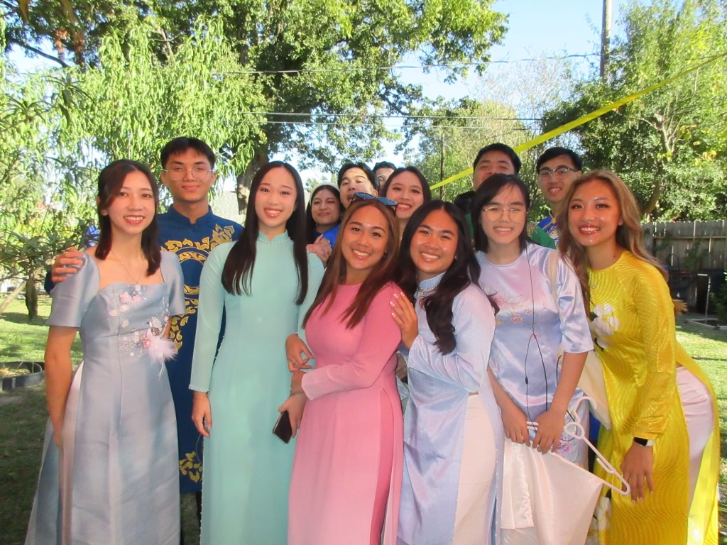 Standing second from the right, Nguyen poses with her relatives dressed in áo dài, a traditional Vietnamese dress. Áo dài is worn for some Vietnamese holidays but is mainly worn during the time of Tết (Vietnamese Lunar New Year).