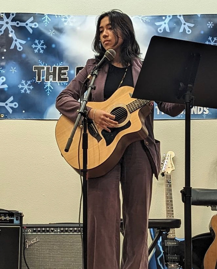 Perez performs at a recital at the West University Community Center. The event was hosted by the music school she attends.