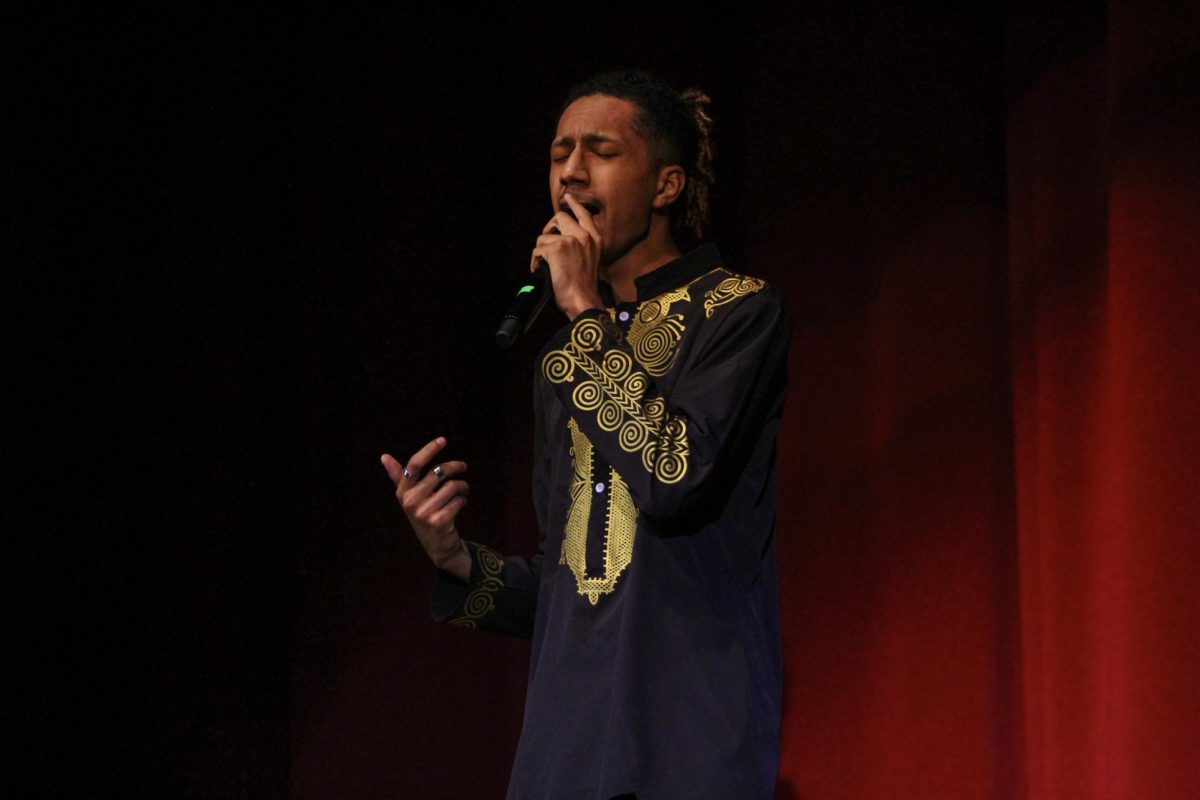 Junior Soleiman BarreraKelly sings “Is This Love” by Bob Marley. Tying into the 2024 Black History Month theme, “African Americans and the Arts,” Percy decided to really focus on the arts for this year’s AAA’s program. The program featured a total of 18 acts, from song and poetry showcases to dance, jazz band and fashion show performances. 