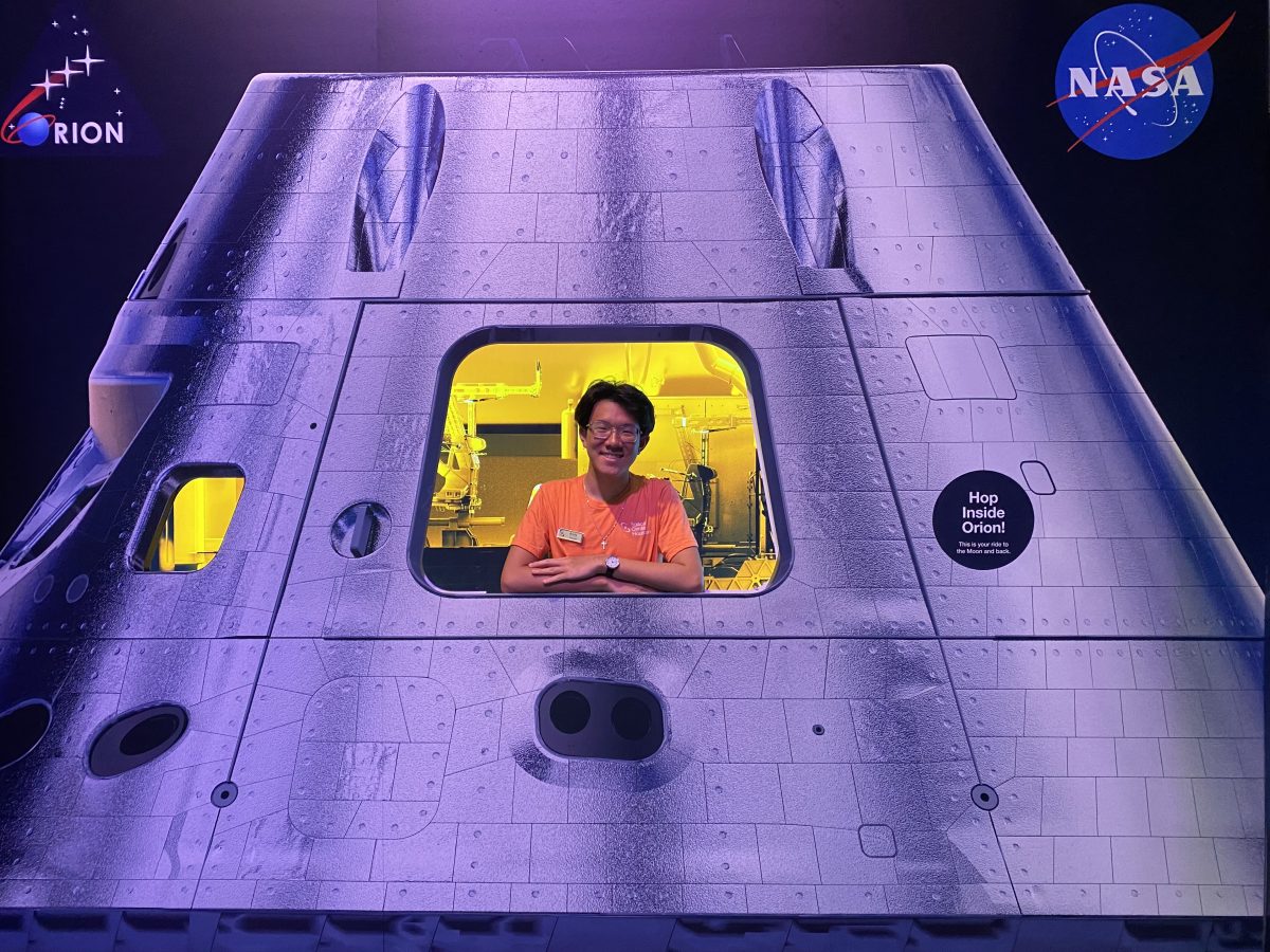 Andy Shen inside the Orion Capsule in the Apollo Exhibit inside Space Center Houston. 