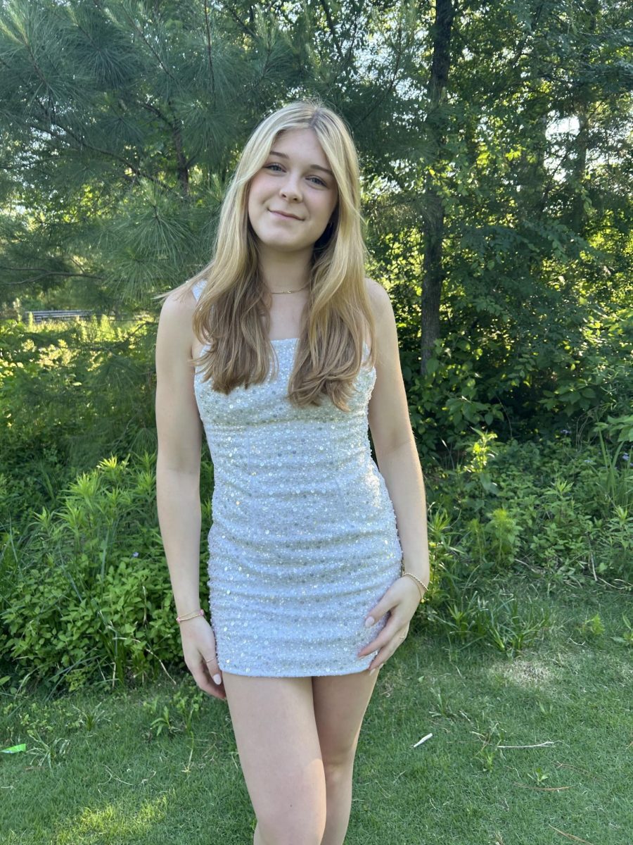 Caroline Pettigrew wears her homemade homecoming dress. It took her two weeks to complete the look which can now be found on her Instagram sewing account: @made_with.care.