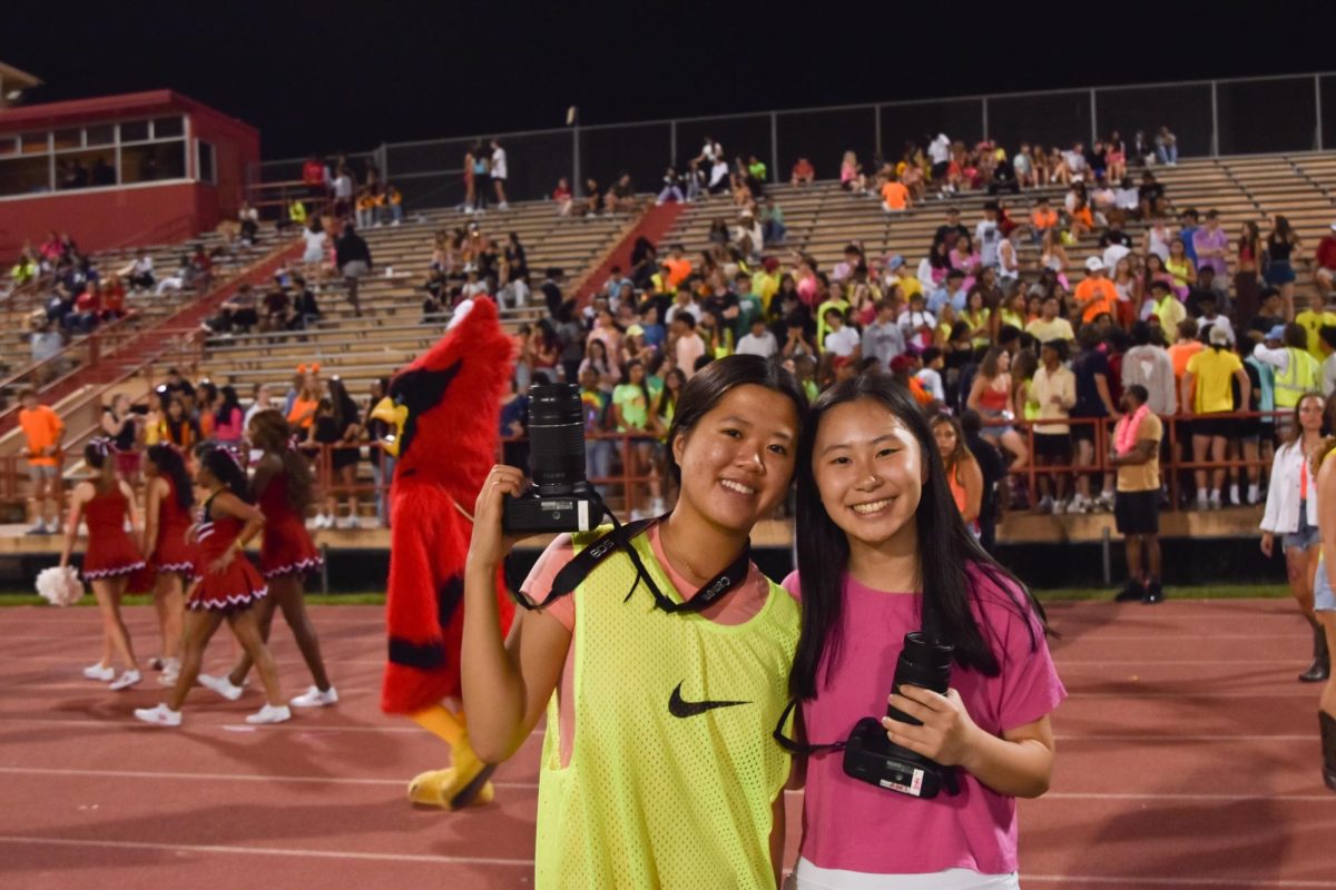 At the 2022 Homecoming game, Karis and Lydia take pictures for TPP. Since then, they have won multiple photography awards in ILPC, TAJE and Best of Texas.