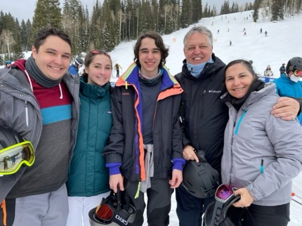 AP Physics 1 teacher Gary Johnson stands with his wife and three kids in Solitude, Utah on a ski trip. "My kids really took to [skiing] fast," Johnson said. "It's a fun time as a family to get out there. You leave everything behind and just hang out together."