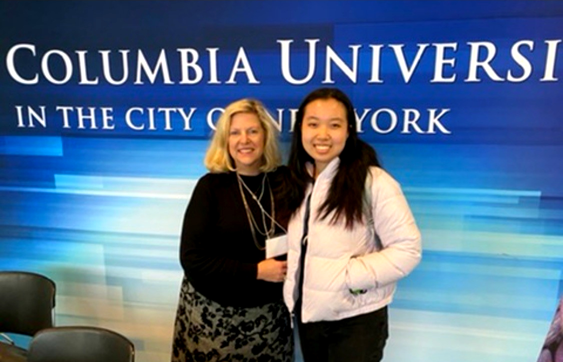 Ann Linsley poses with a former student at a workshop run by the American Geographic Society. She received an award for contributing to the field of geography at Columbia University. 