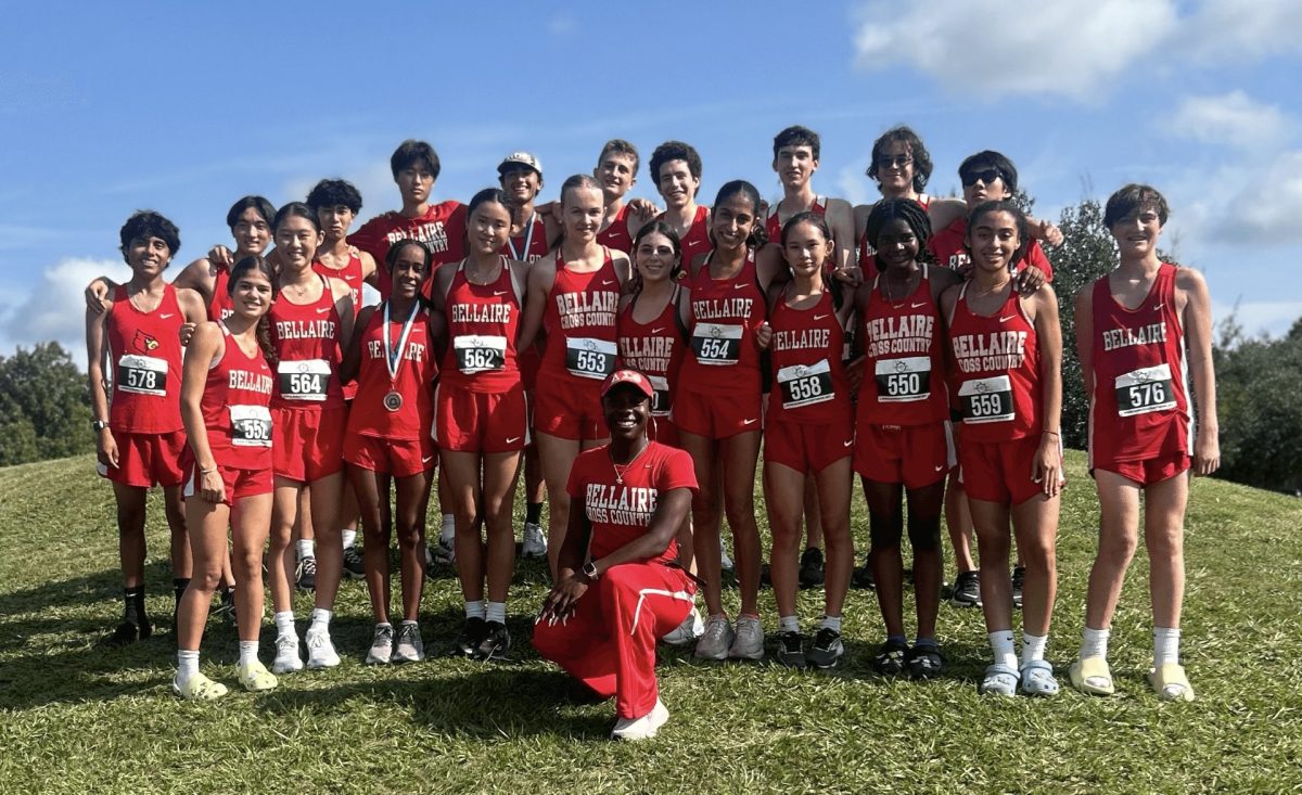 Coach (Courtney) Meekins poses with her team after the Spring Branch ISD meet at Nottingham Park