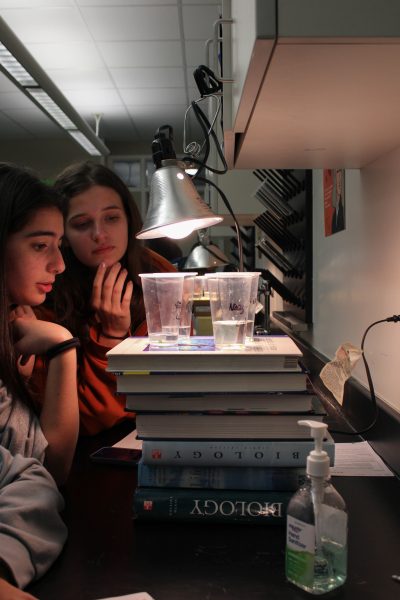 Students eagerly observe and record results for their photosynthesis lab, uncovering the science behind energy conversion with light. "I'm always interested in learning to do new things that help students learn and make the process more enjoyable," Charbonneau said.