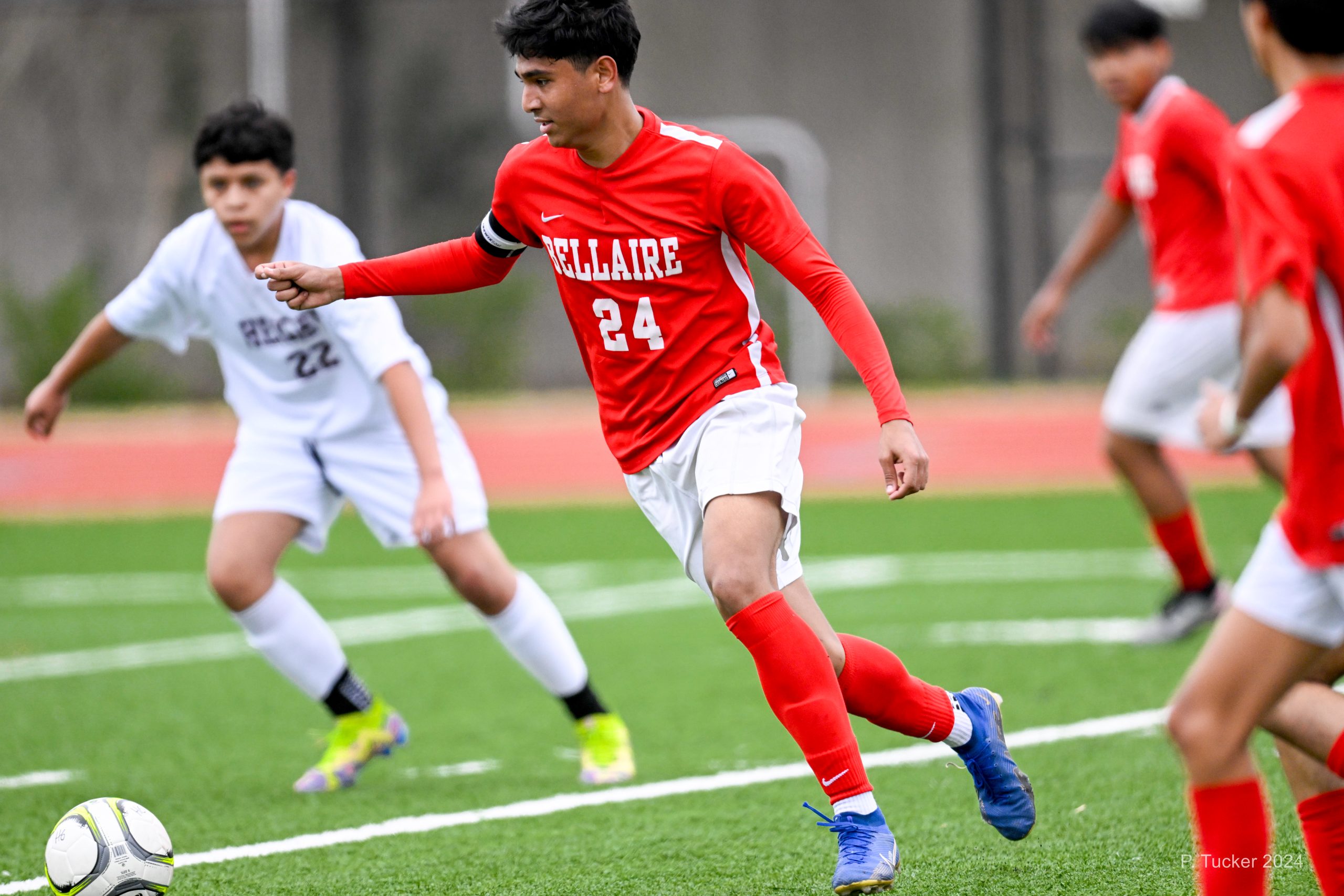 David Chiesa (#24) maintains focus as he attacks the ball. Chiesa plays striker for Bellaire soccer.