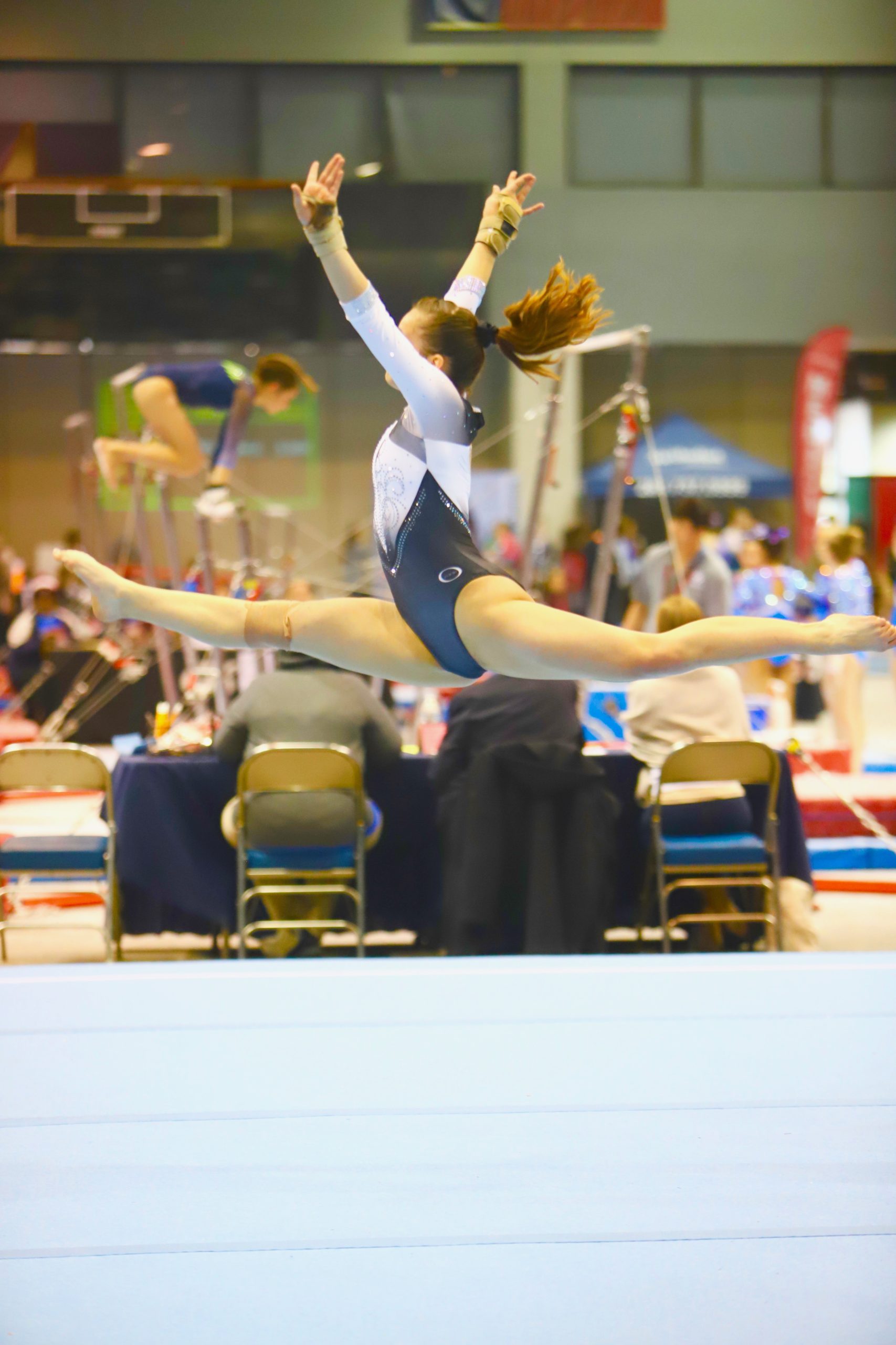 Gabriella Alvez-Gillete completes a stationary leap at Texas regionals. She placed second overall.