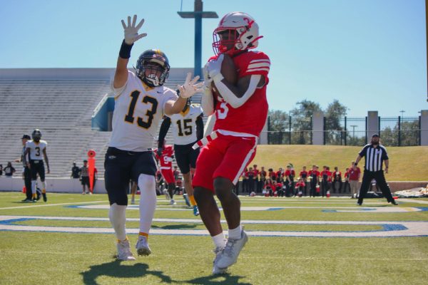 Junior wide receiver Tony Miller scores his third touchdown during the third quarter of the game. The Cardinals were now up 28-0 against the Sam Houston Tigers.