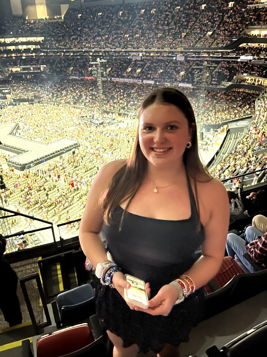 I pose for a photograph inside the Caesars Superdome before the concert begins.