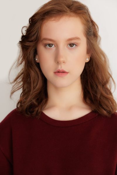 Giulia Ewing poses for her first photoshoot in 2021. Her headshot is used for her profile for castings.