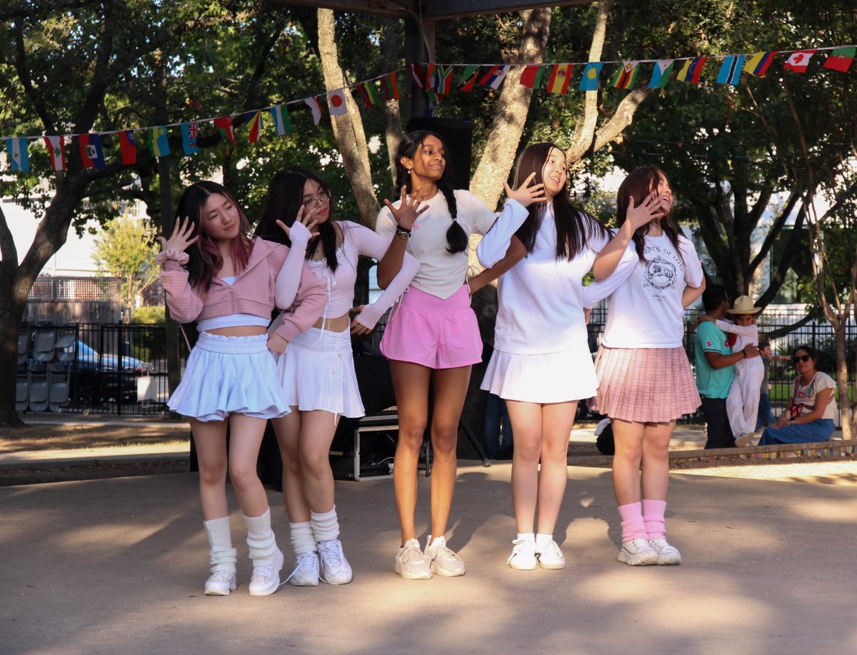 K-pop Club members danced to "Magnetic" by ILLIT at the festival. “We chose the song because it's a popular song this year," senior Kaitlyn Endique said. "And it has five members, and we only have five people."